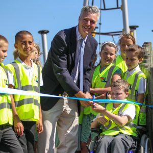 MP Simon Kirby cuts the ribbon